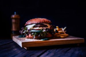 tasty farmer's market burger on a wooden plank