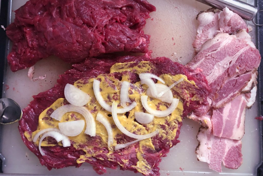beef rolls with mustard and onions