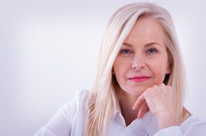 older woman holding with beautiful skin